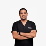 Patient discussing invisible braces treatment with an orthodontist in Dubai