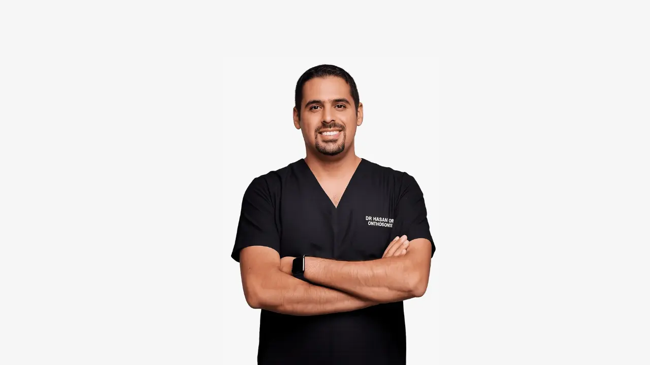 Patient discussing invisible braces treatment with an orthodontist in Dubai